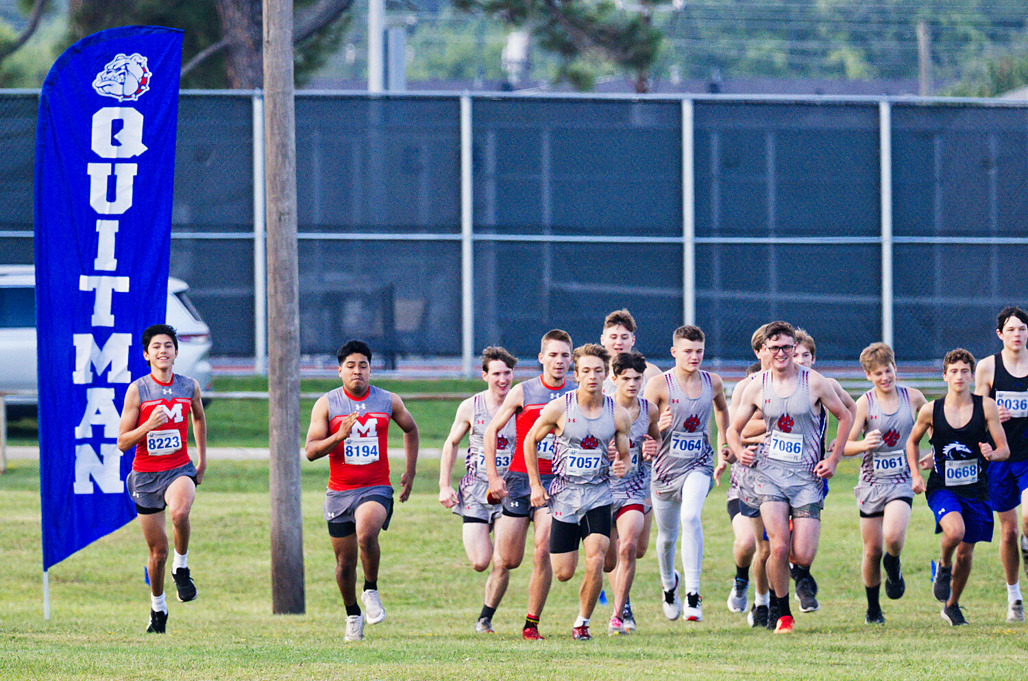 The varsity boys cross country teams for Mineola and Alba-Golden begin their meet at the Quitman invitational. [catch the cross-country competition]